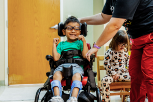 A group of people with disabilities celebrating Disability Pride Month